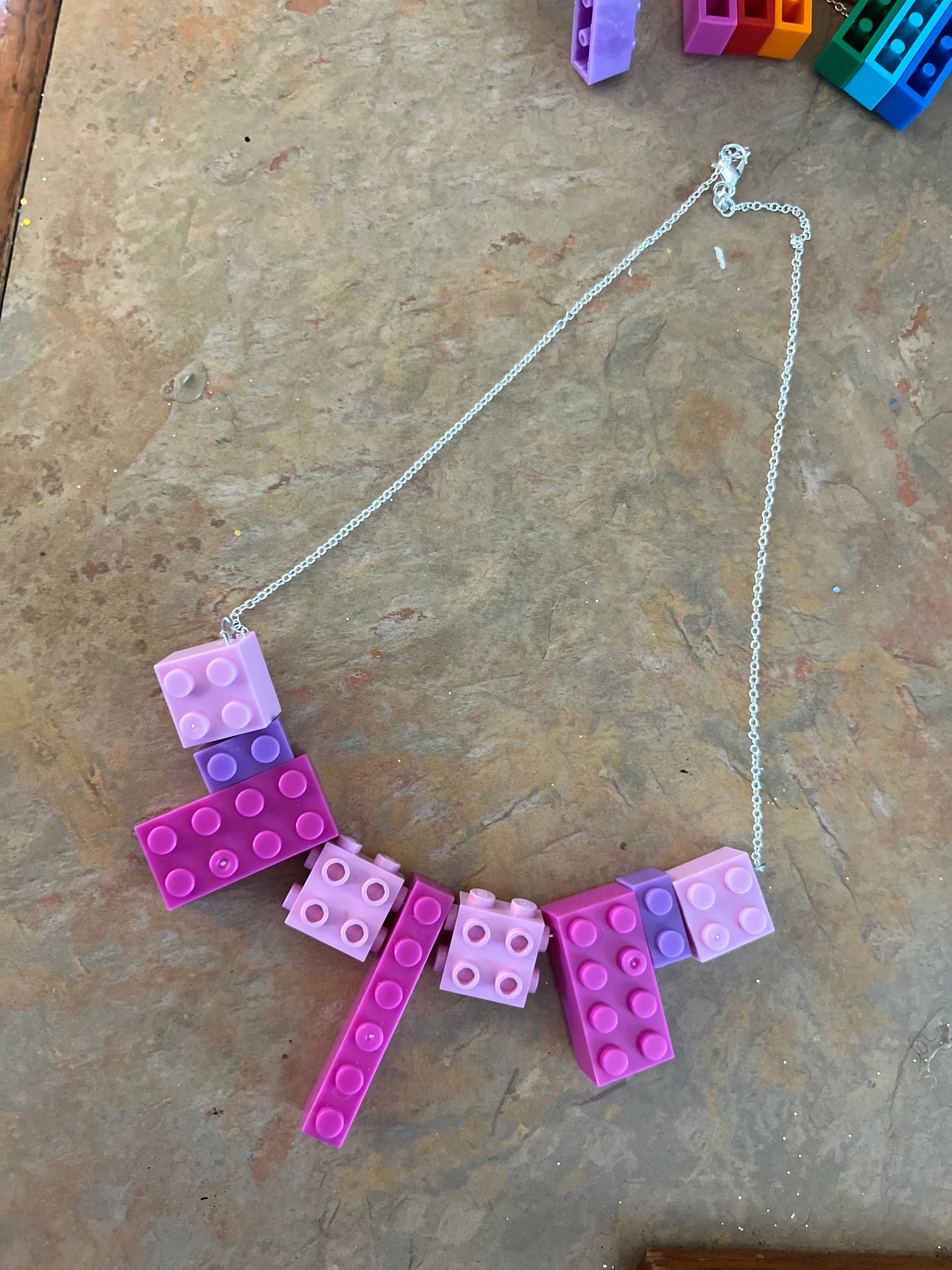 Lego necklace silver chain pink hues